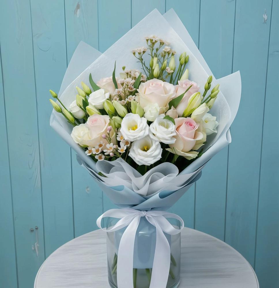 Букет цветов из: Розы и Лизиантусы в Талах